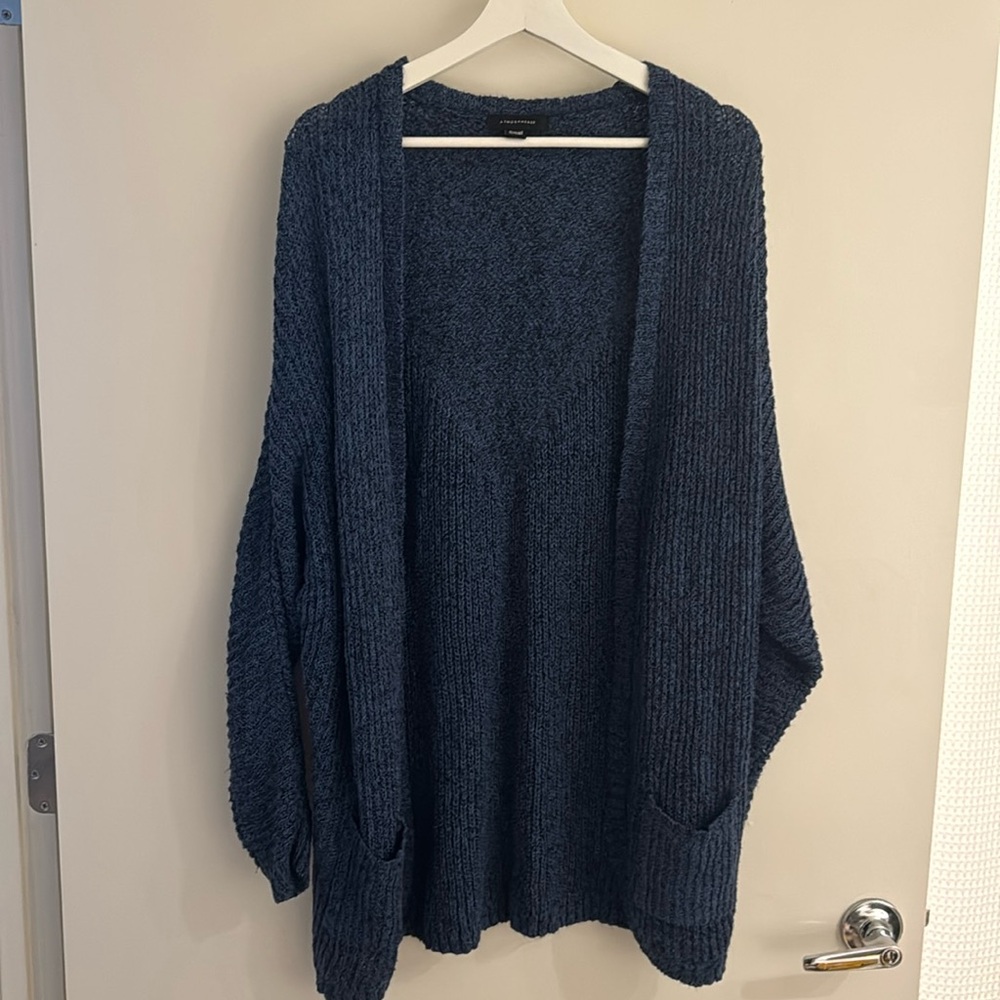 Long blue cardigan with front pockets